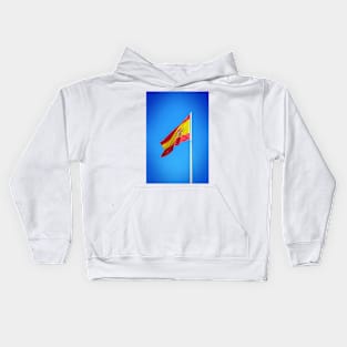 Spanish flag waving against clear blue sky Kids Hoodie